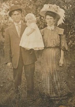 Ardra V. King, as a young man, with his wife and daughter